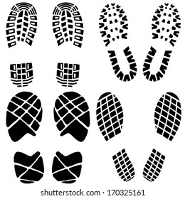 Set of black imprint soles shoes. Vector illustration. Tourist concept.