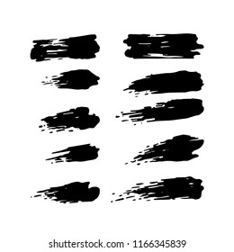 Set of black ink brush strokes isolated on the white background