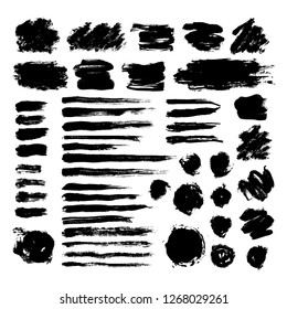 Set of black ink brush strokes isolated on white background. Hand drawn stains for backdrops. Grunge artistic brushes, text boxes, lines, splash, paintbrush collection - freehand vector illustration