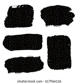 A set of black ink brush strokes with gold dots texture, isolated on white background. Hand drawn graphic design elements with copy-space.