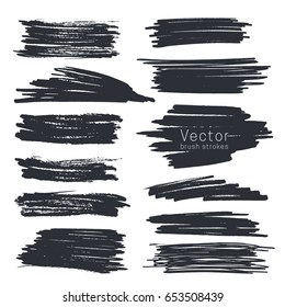 Set of black ink brush strokes isolated on white background