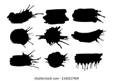 Set of black ink splashes and drops made with brush. Blobs and spatters. Isolated vector illustration