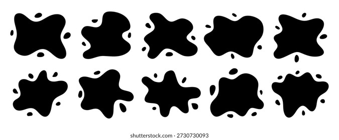 Set of black ink splatters including rounded liquid puddles, splatters, and tiny droplet accents