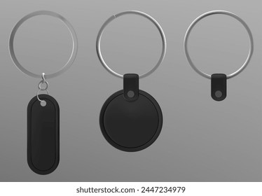 Set of black leather keychains isolated on background. Vector realistic illustration of oval and round shape blank fob on silver metal ring, souvenir pendant mockup with space for branding, accessory