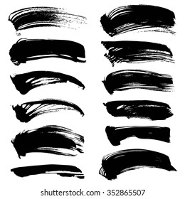 Set of black long abstract handdrawn strokes  isolated on a transparent background