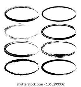 Set of black oval grunge frames. Vector illustration.