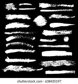set of black paint brushes lines on the black background collection