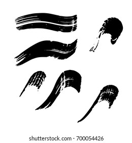 Set of black paint, ink brush strokes, brushes, lines. Dirty artistic design elements.