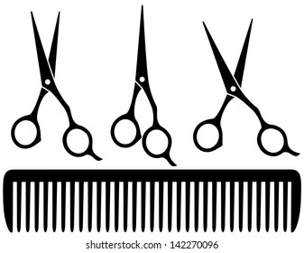 set of black professional scissors on white background and comb