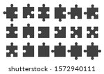 Set black puzzle pieces isolated