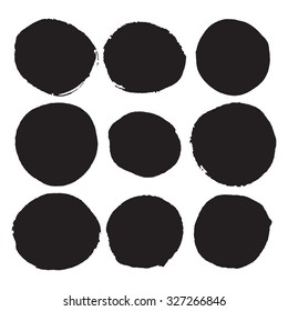 Set of black round ink stains. Grunge circles. Vector illustration