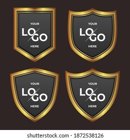 a set of Black shield with golden frame isolated on VIP background. Vector luxury design element. element for logo place.