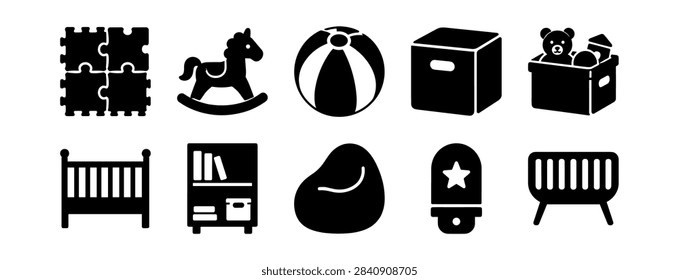 Set of black silhouette icons representing children's toys and nursery items including puzzle pieces, rocking horse, ball, toy box, crib, bookshelf, bean bag, nightlight