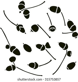 set of black silhouettes of acorns. Vector illustration .