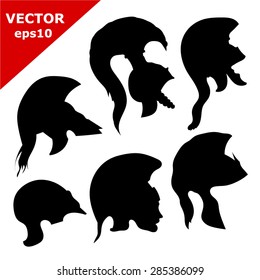 Set of black silhouettes of ancient helmets. Vector illustration