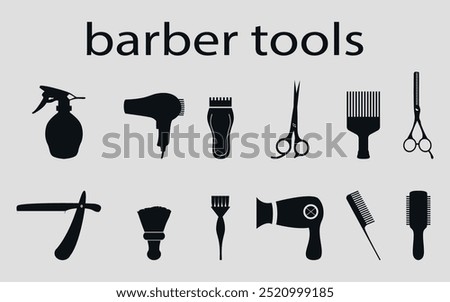 Set of black silhouettes of barber tools. Vector on a gray background
