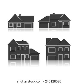 Set of black silhouettes cottages isolated on white background. Vector Illustration