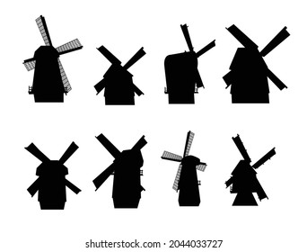 Set of black silhouettes of dutch windmills in realistic style vector illustration isolated on white background. Collection of old, vintage rural mills, farm buildings.