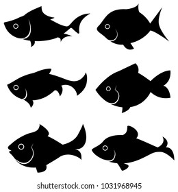 Set of black silhouettes of fish of different shapes. Vector illustration.