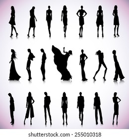 Set of black silhouettes of high fashion clothed women