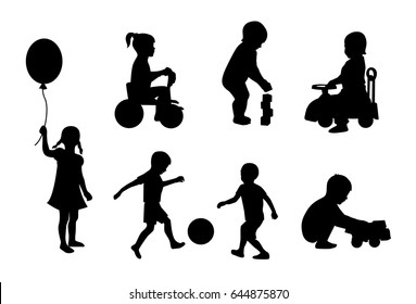 Set of black silhouettes playing children on a white background