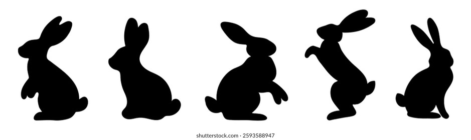 Set of black silhouettes of rabbits in different poses
