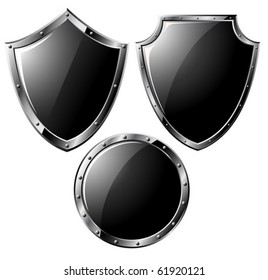 Set of black steel shields - isolated on white (vector)