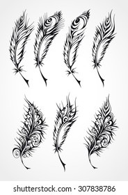 Set of black stylized fantastical feathers