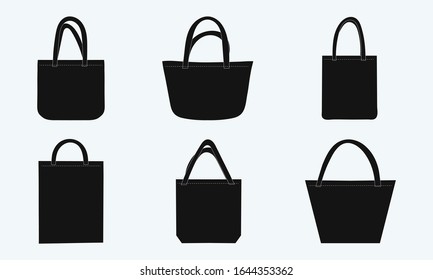 Set of black tote shopping eco fabric bags. Vector illustration of mockup blank template isolated on white background. Canvas bags.