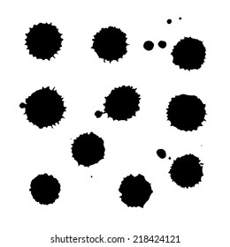 Set of black traced ink splatters. Vector clip-art. Splatter isolated on white background.