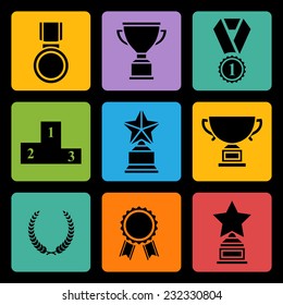 Set of  black vector award success and victory icons with trophies stars cups ribbons rosettes medals medallions wreath and a podium on a color square