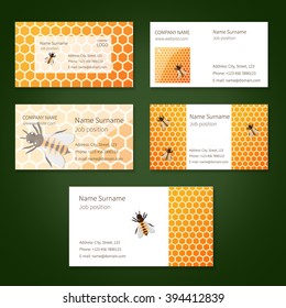 Set of black vector business cards with yellow honeycomb and bees.