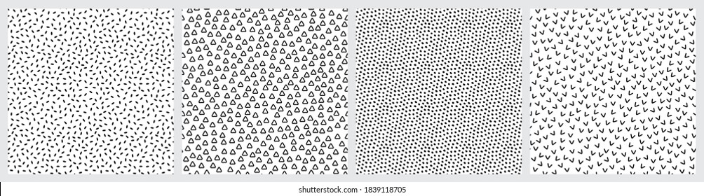 Set of black and white abstract texture patterns. Rice, sprinkles, spots, marks, triangles, arrows, corners seamless patterns on white background.