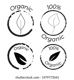 Set of black and white badges and icons with leafs "100% Organic". Vector illustration with set of labels and seals for cosmetic and food packaging.