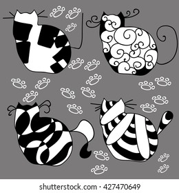 set of black and white cats on a gray background