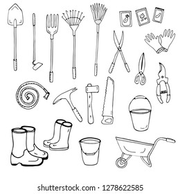 Set of black and white drawings of garden tools. Vector
