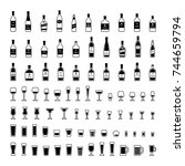 Set of black and white icons bottles and glasses of alcohol. Vector