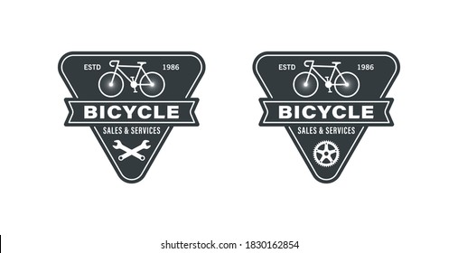 Set of black and white illustrations of bicycle, wrenches, vintage ribbon and text on a white background. Vector illustration for logos, emblems, labels. Bicycle sales shop, repairs and services.