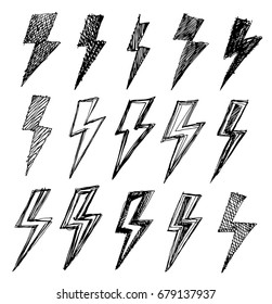 Set of black and white lightning. Inky symbols of thunderbolt. Grungy signs of lightning