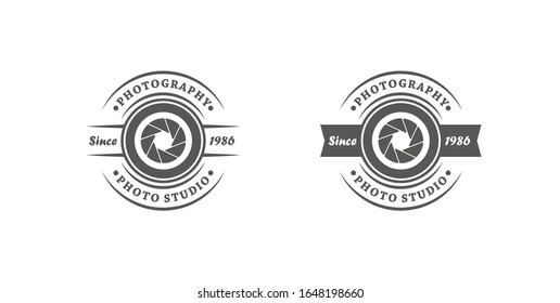 A set of black and white logos advertising the services of a photographer. Vector illustration of a camera lens, text on a white background. Studio photo logo.