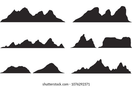 Set of black and white mountain silhouettes.Background border of rocky mountains.