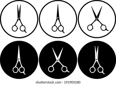 set of black and white scissors in frame