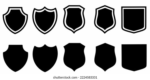 Set of black and white shield icons. stock vector