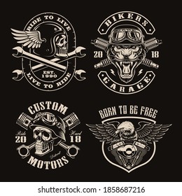 A set of black and white vintage biker emblems on dark background