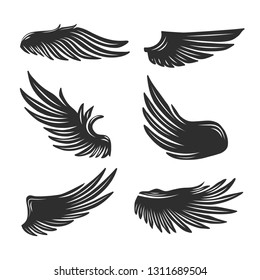 Set of black wings isolated on white. Vector illustration.