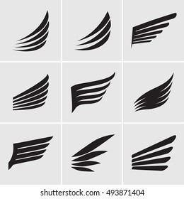 Set of Black Wings. Vector Icons.