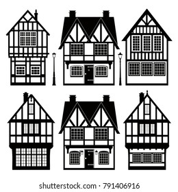 Set of black-and-white cottages and lampposts. Vector illustration.