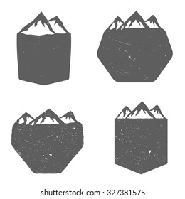 Set of blank badges (shields) with mountains, in vintage monochrome style. Badges templates for your design. Labels, icons, logos, signs, emblems templates. Vector illustration
