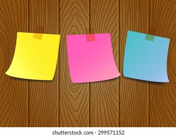 Set of blank paper notes on wooden background.