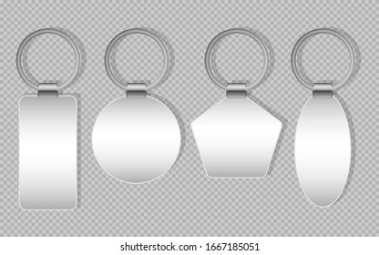 Set Of Blank Trinkets Of Different Shapes On A Gray Background. Key Metal Jewelry.